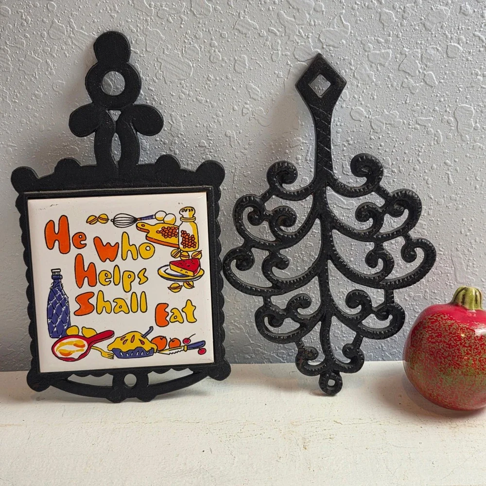 Vintage Cast Iron Trivets 'He Who Helps Shall Eat' Ceramic Tile & Scroll Pair